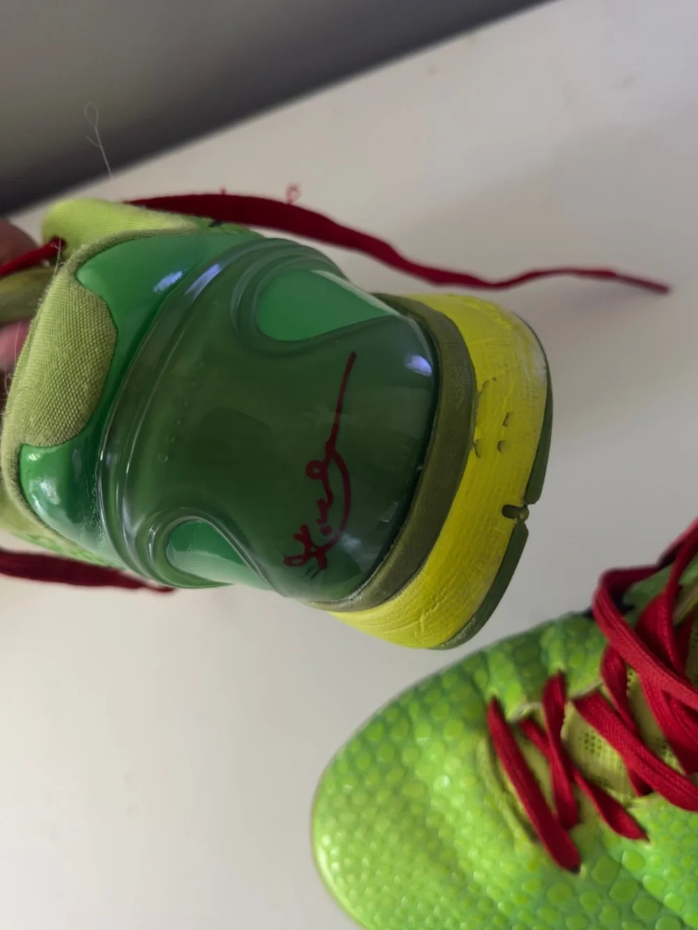 Nike Kids Neon Green Basketball Sneakers with Red Laces
